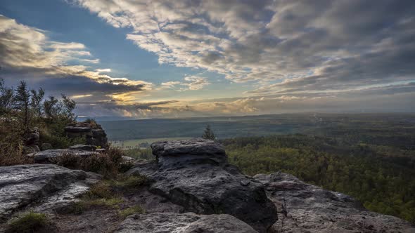 Time lapse of a beautiful place in the mountains region of Bohemian Switzerland at sunset.