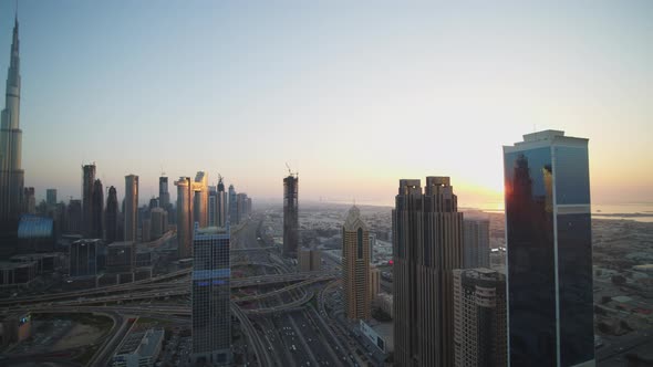 Panoramic View of Urban City Center of Dubai with Burj Khalifa Skyscraper and Busy Highway Traffic
