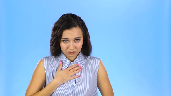 Young Woman Feeling Nauseous Touching Her Chest