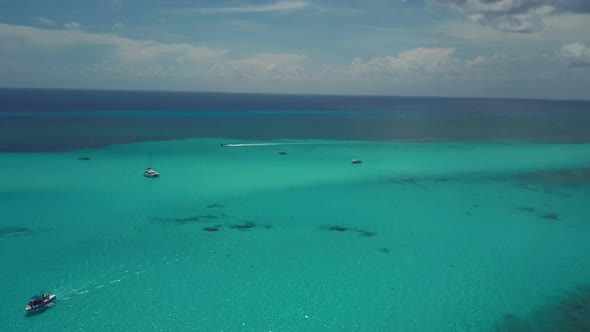 4k 24fps Blue Water In The Caribbean With Boats Ans Starfish