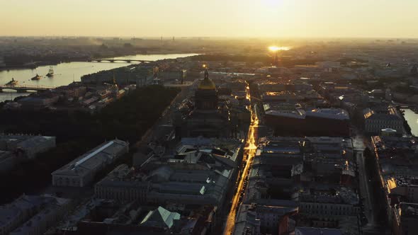 Golden Dome of Isaac Cathedral at Sunrise Aerial Morning Cityscape with Warship in the Neva River