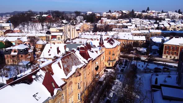 Aerial view of a drone flying over the building