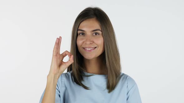 Okay, Sign of Excellence, Beautiful Girl, White Background in Studio