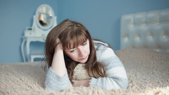 Woman Lies on the Bed Crying and Worried Woman Had a Fight with a Boy Friend