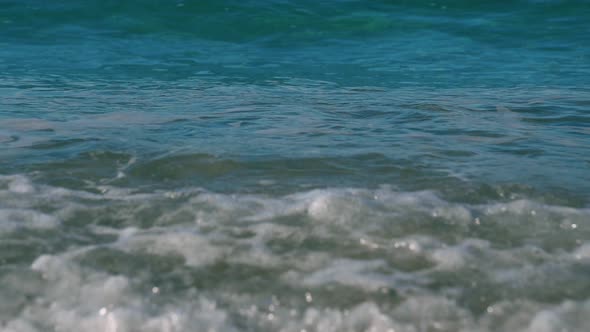 Sparkling Fresh Wavy Water is Shining on a Sunny Summer Day