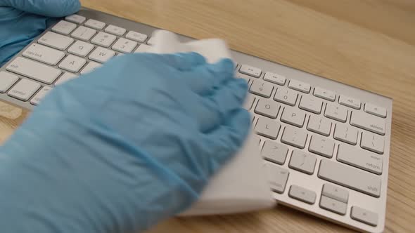 Cleaning the Desktop Keyboard in the Office, Maintaining Hygiene Concept and Fighting Coronavirus
