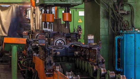 Conveyor Assembly Stage the Body of Tractor at Big Industrial Factory Timelapse