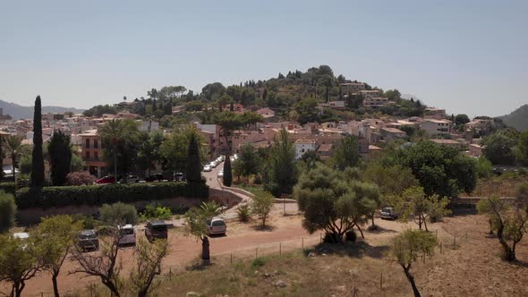 AERIAL: Mediterranean city on hills with traditonal houses in mallorca