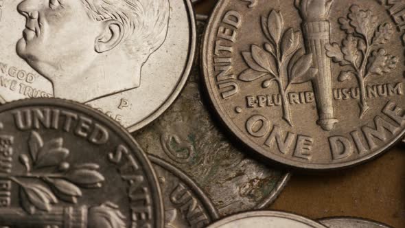 Rotating stock footage shot of American dimes (coin - $0.10) - MONEY 0205