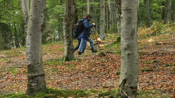 Couple Use Trekking Poles