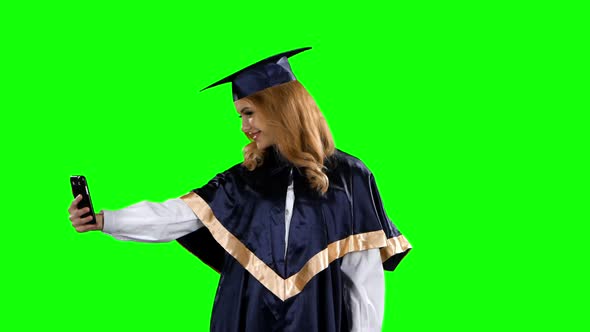 Graduate Take Self Portrait. Green Screen