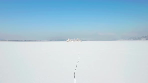 Drone Above Vast Snow-filled Landscape In Birds Island, Poland During Winter. aerial