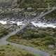 Hanging Bridge Across Highland River at Hooker Valley Track - VideoHive Item for Sale