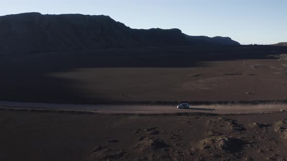 Aerial view of a vehicle driving a twisty road, Reunion.