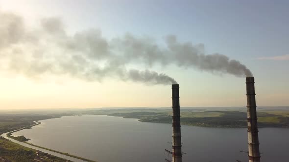 Aerial View of High Chimney Pipes with Grey Smoke From Coal Power Plant