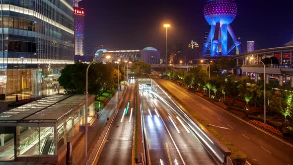 Shanghai Heavy Street Traffic Pan Up