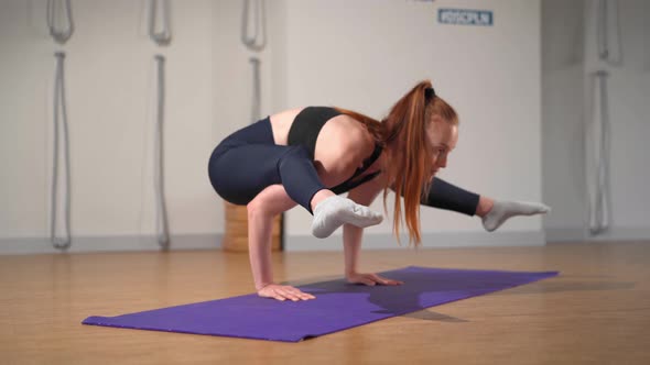 Fitness coach teaching yoga online to group of people. People practicing yoga with trainer via video