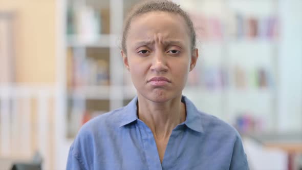 Portrait of Sad African Woman Crying at Camera