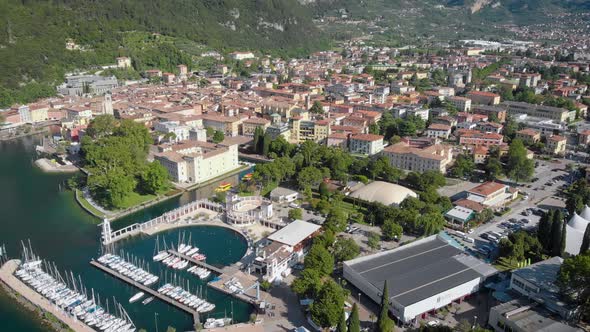 Aerial View of Port City in Sunny Weather in Summer, Drone Is Flying Up, Showing Panorama of Town