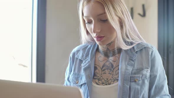 Woman using laptop computer