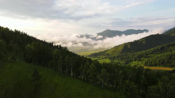 Aerial Photography of a Mountain Valley Against the Backdrop of a Beautiful Sky