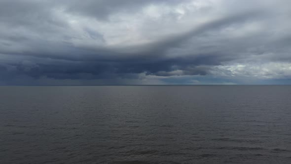 aerial drone fight into a stormy sea