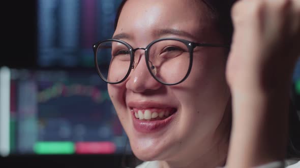 Close Up Of Female Stock Market Broker Working On Computer And Celebrating With Analyzing Graphs