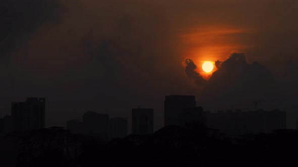 Landscape sunrise with building silhouette in Johor Bahru City in Malaysia