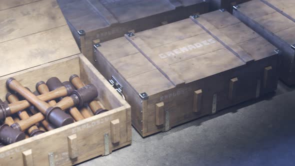 Military boxes with grenades. Huge stack. Warehouse. Endless animation. 4KHD