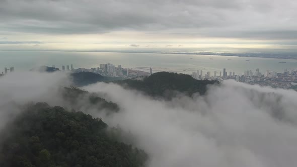 Aerial view white cloud surrounding Penang Hill