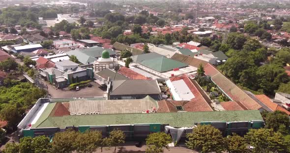 Top view aerial photo from flying drone of a Cirebon City with development buildings, transportation