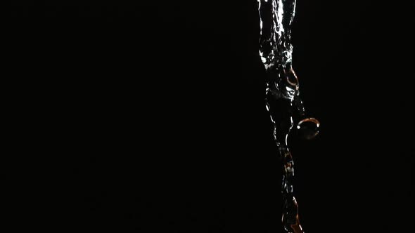 Water pouring and splashing in ultra slow motion 