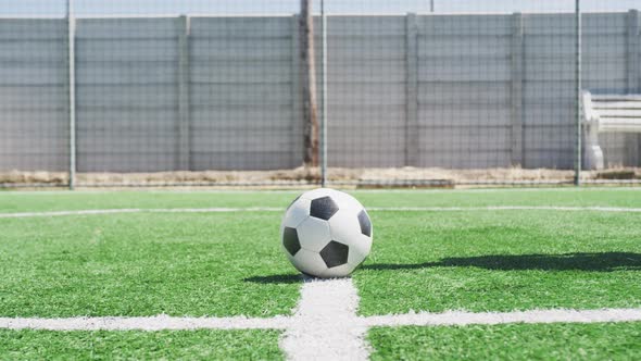 Soccer player with prosthetic leg on field