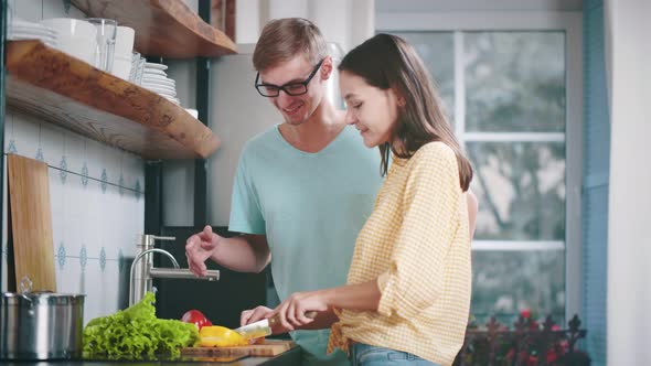 Happy Couple Enjoying Cooking Time Together at Home.