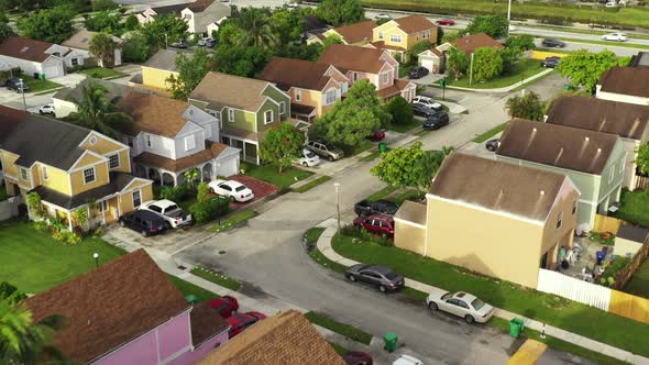 Flying Over Neighborhood Tilt Down Reveal Small Backyards