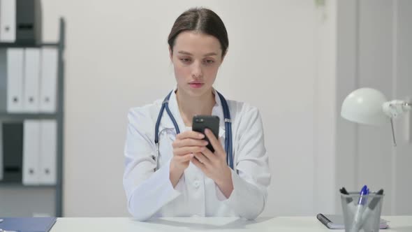 Female Doctor Using Smartphone