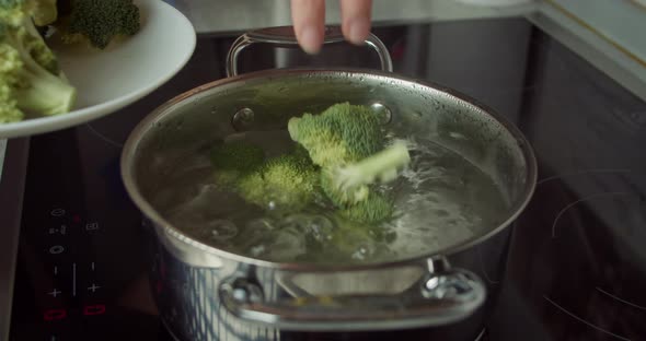 Broccoli Begin Cooking in Pot of Boiling Water