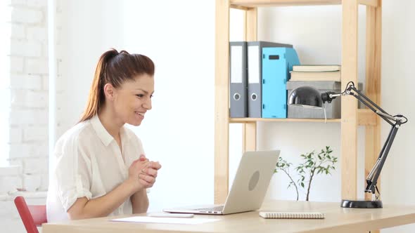 Woman  Celebrating Success at Work