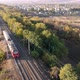 railroad and train in autumn forest in foggy sunrise.  view rural railway - VideoHive Item for Sale