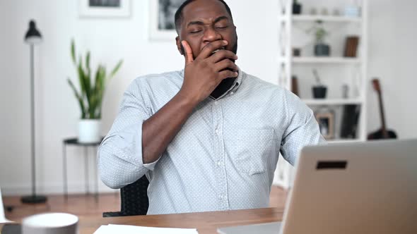 Tired of Work with Laptop African American Guy