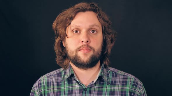 Adult Caucasian Guy Shows Sign Bingo