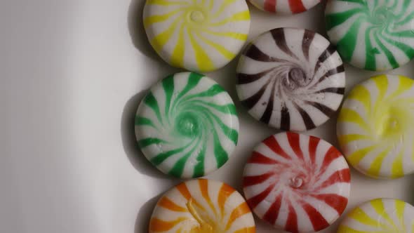 Rotating shot of a colorful mix of various hard candies - CANDY MIXED 