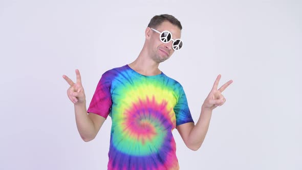 Hippie Man Wearing Sunglasses with Peace Sign