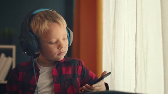 Caucasian Boy Listening to Music