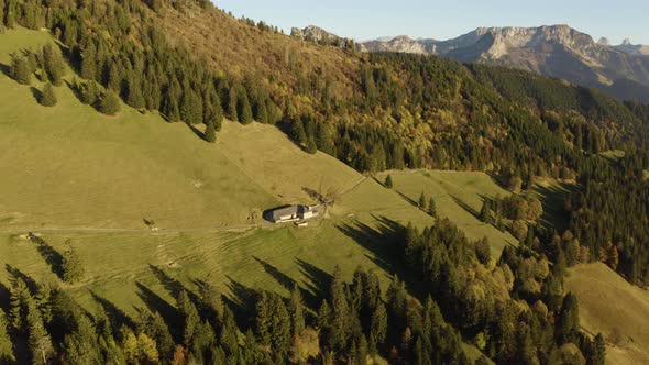High orbit around alpine pasture, autumn atmosphere at sunset. "Le Folly", Vaud - Switzerland
