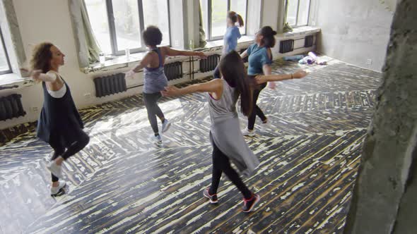 Young Women Dancing Zumba