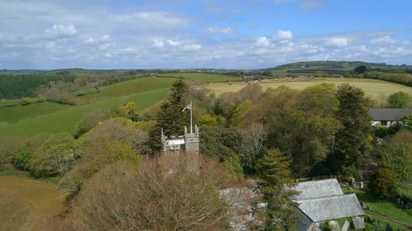 Low Flyby of an English Church and Flag