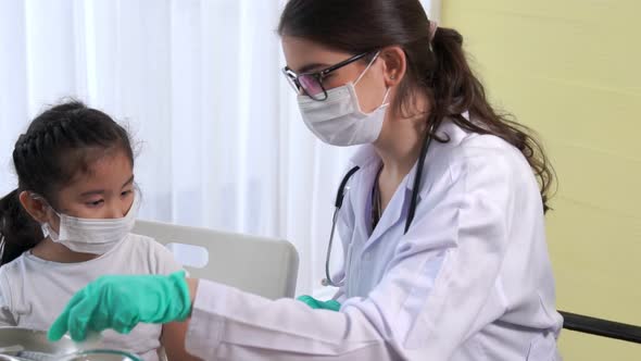 School Girl Visits Skillful Doctor at Hospital for Vaccination