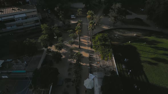 Aerial view over Ines de Suarez Park at Santiago de Chile with trees in the scene on a sunny day