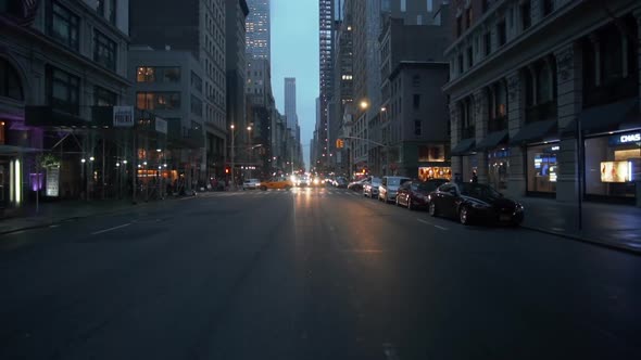 Street View of Car Traffic on the Intersection in NYC